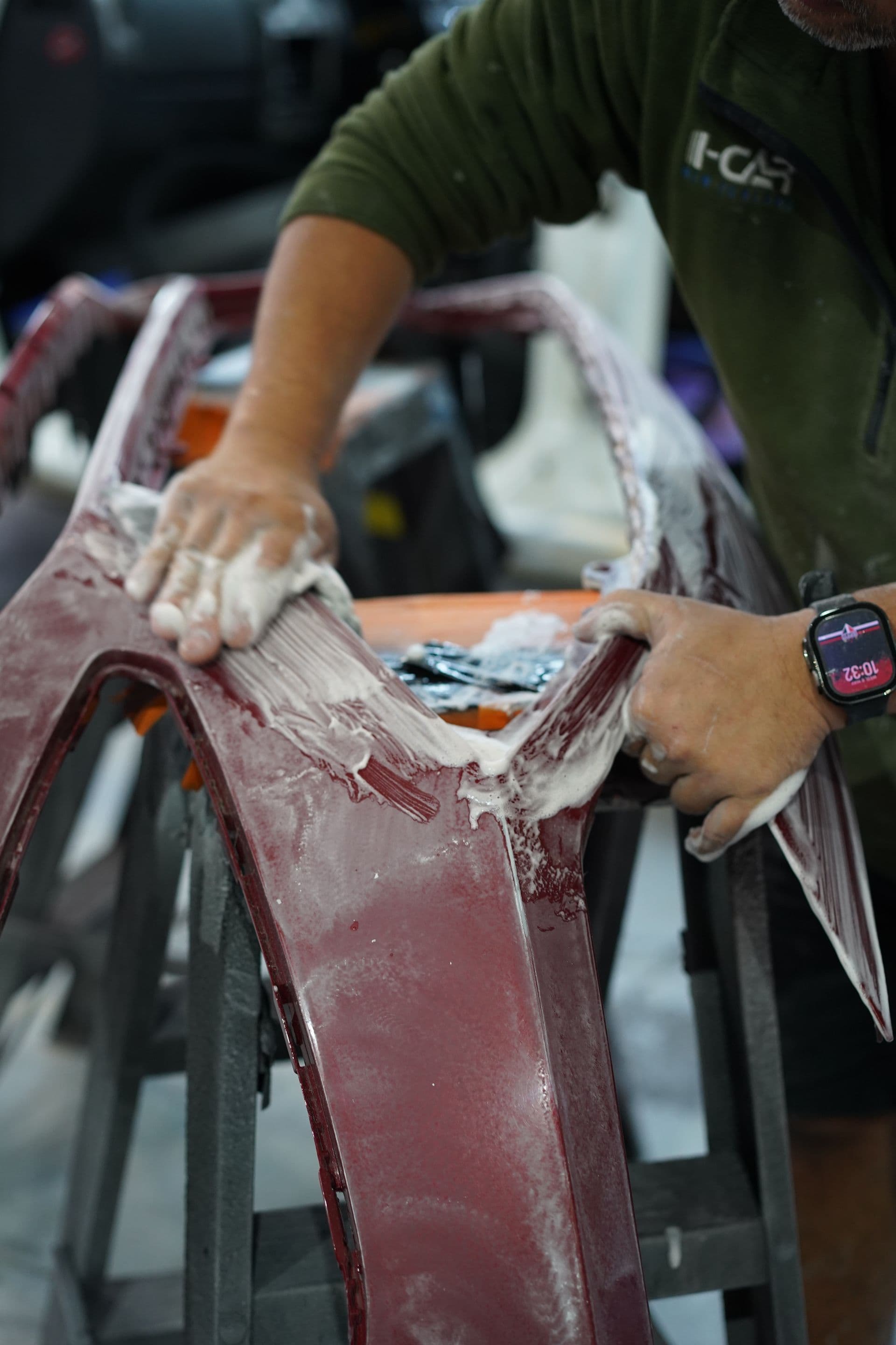 Damaged bumper being repaired on the bench