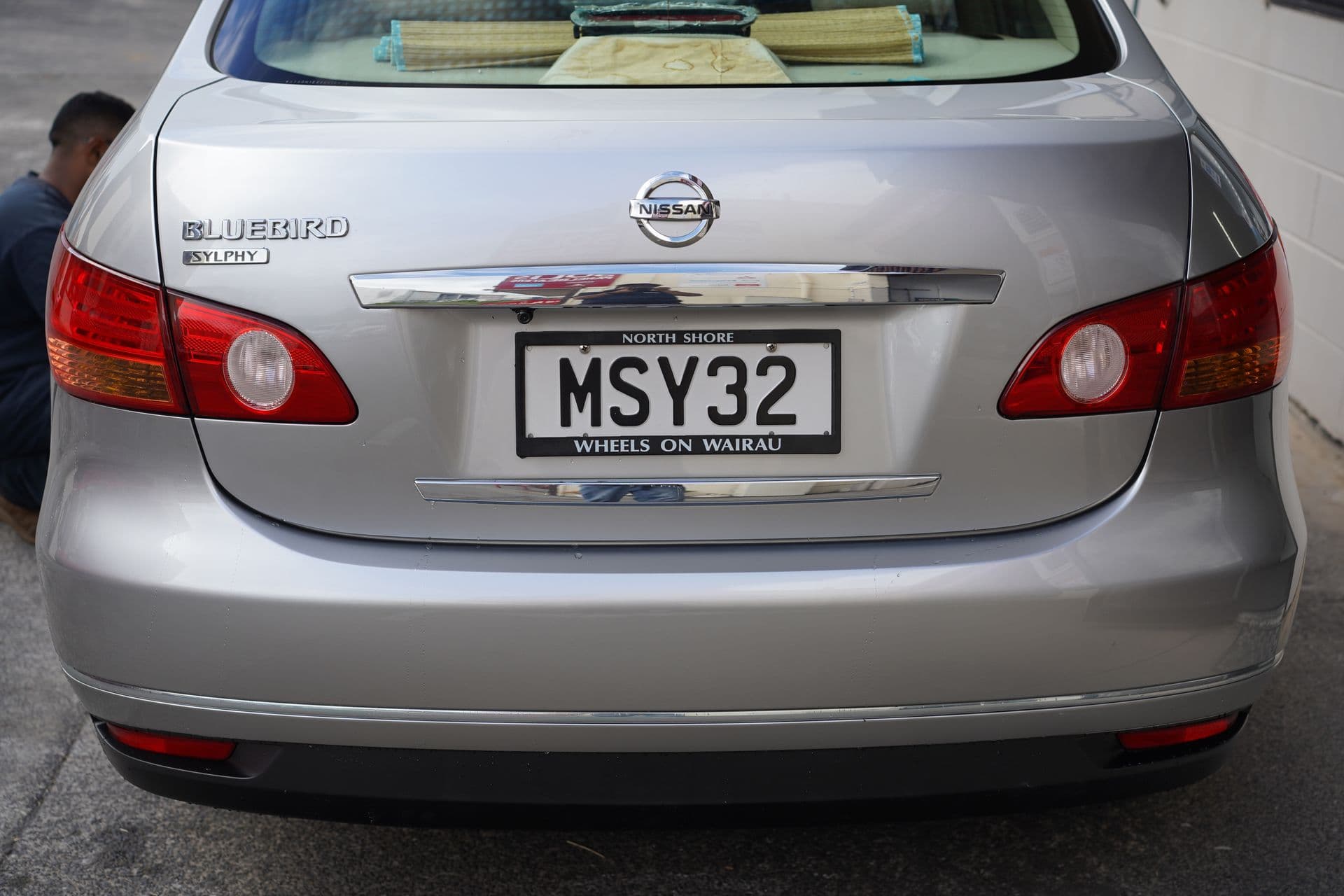 Finished silver sedan after repair at Solis Panelbeaters