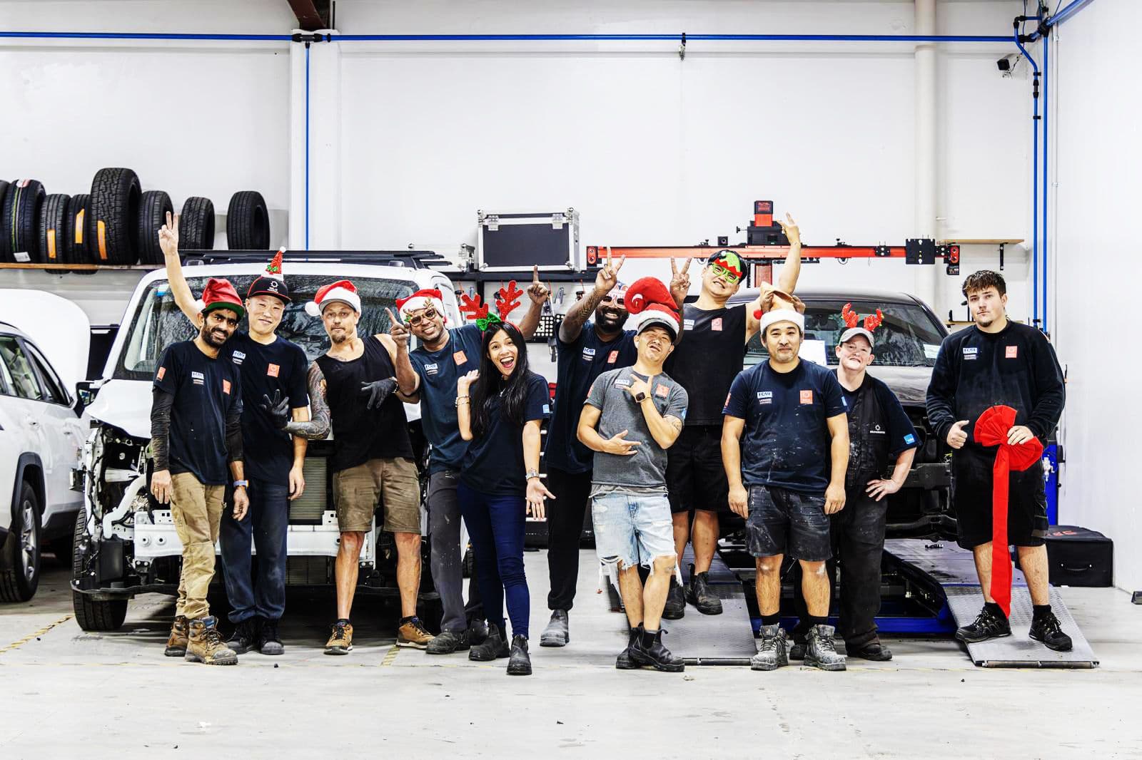 The Solis Panelbeaters team on the workshop floor